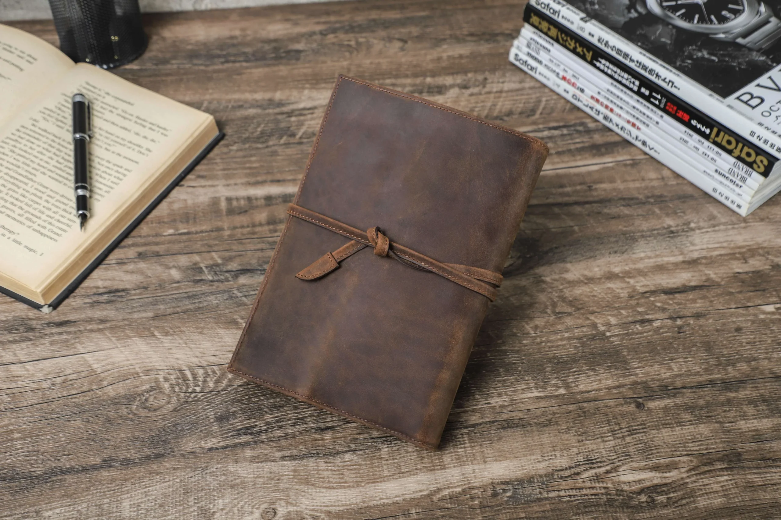 Leather journal on desk