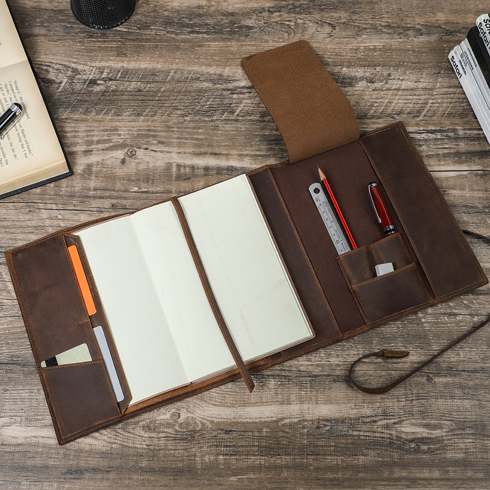 Writing in a leather journal